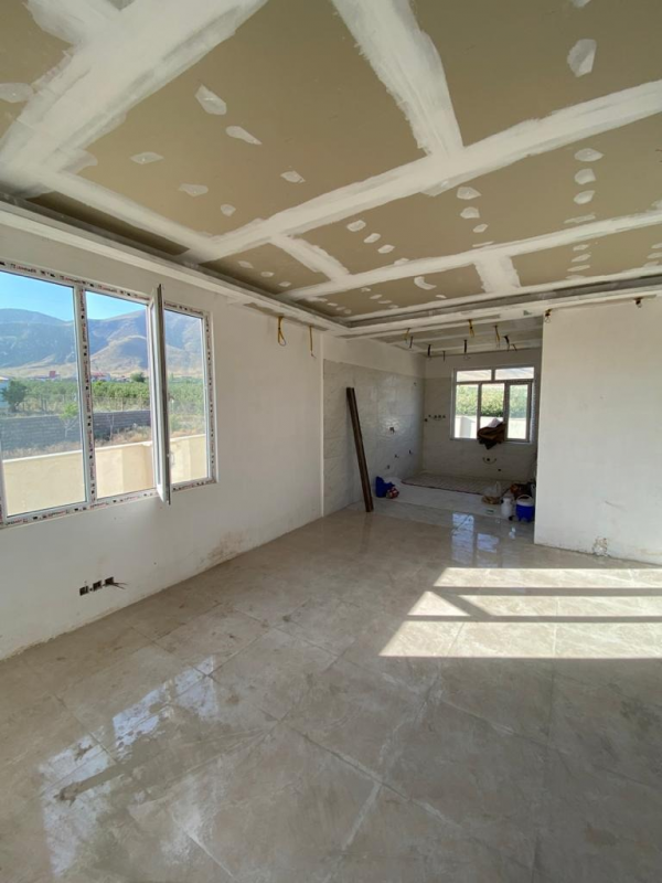 مرحله دهم: اجرای سرامیک یا سنگ کاری کف واحد مرحله دهم: اجرای سرامیک یا سنگ کاری کف واحد